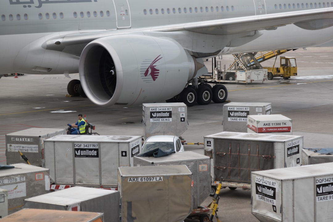 a-large-airplane-is-being-loaded-with-luggage-mihhrmlddh8